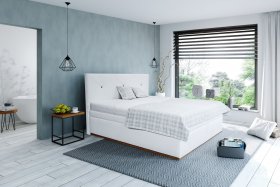 Úkázka dekorativního pléd v látce Valencia na posteli Dalia společně s dekorativními polštáři